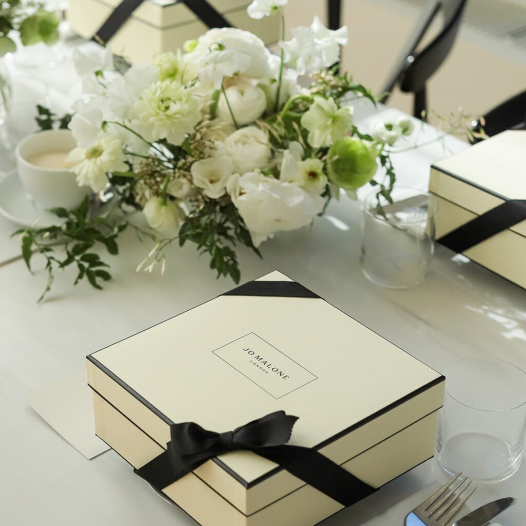 Jo Malone London box on table with flowers