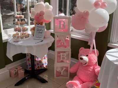 Baby Shower Afternoon Tea at Downham Hall Essex baby shower setup at Downham Hall Orangery Essex with balloons decorations and afternoon tea